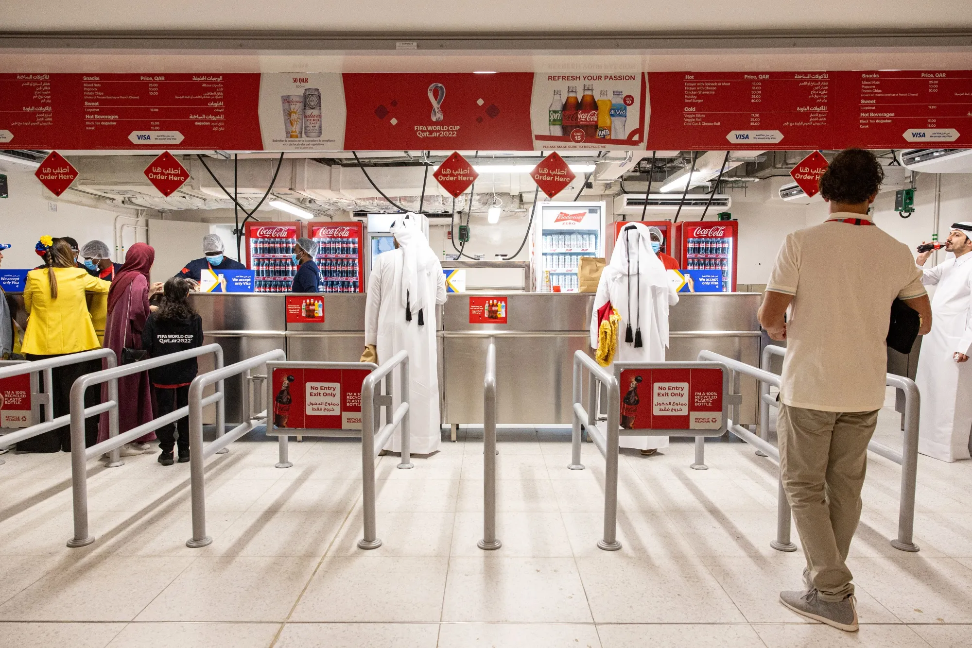 A drinks kiosk selling Coca-Cola beverages at Al Bayt Stadium in Qatar.