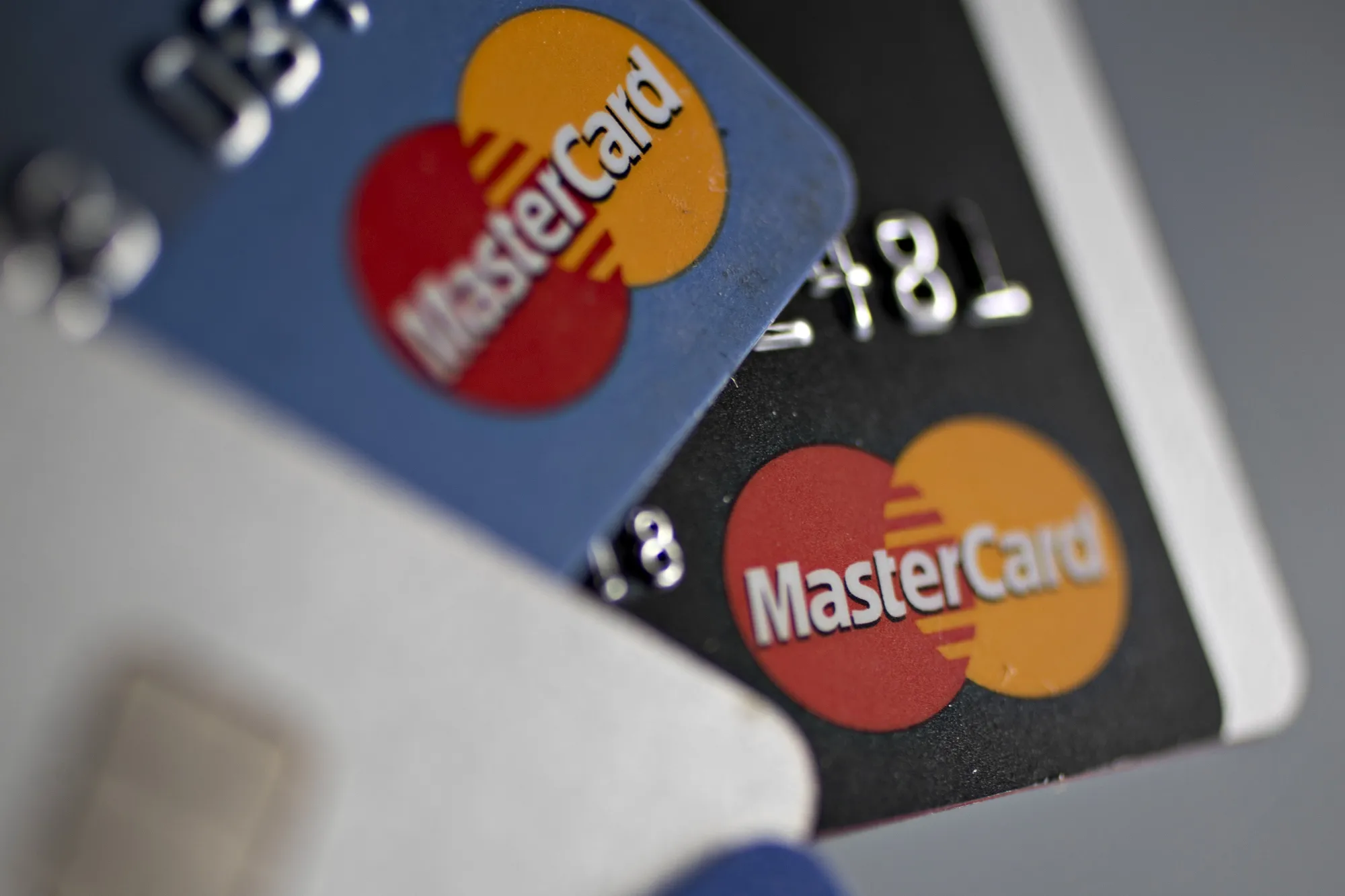 Mastercard Inc. credit cards are arranged for a photograph in Washington, D.C., U.S., on Monday, Oct. 24, 2016.