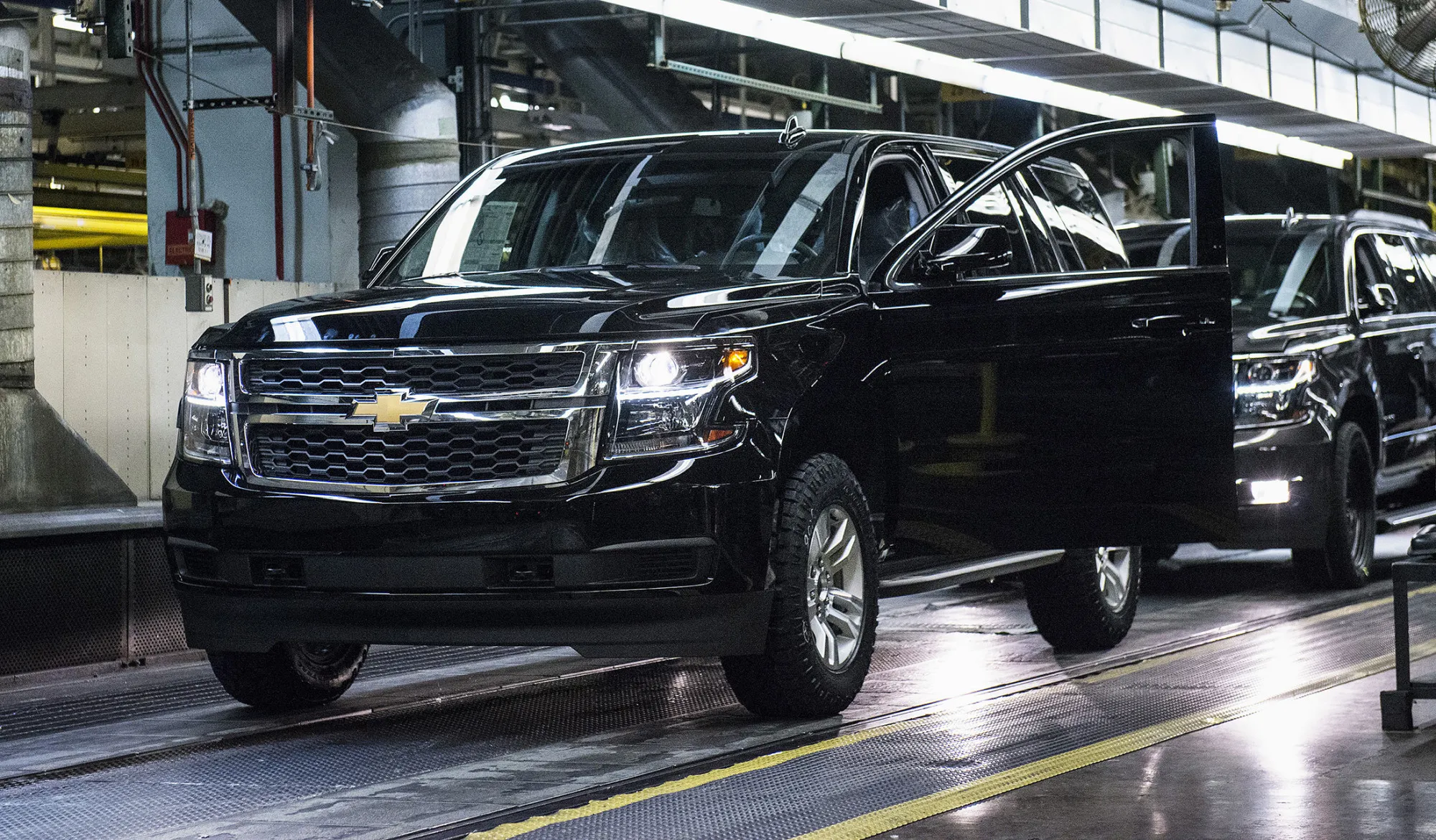 A Chevrolet Suburban sports utility vehicle (SUV) waits to be driven off the production line at the General Motors Co. (GM) assembly plant in Arlington, Texas, on March 10, 2016.

