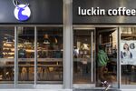 A customer enters a Luckin Coffee outlet in Beijing.
