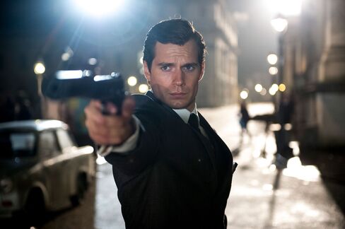 Cavill's Napoleon Solo is a sure shot—in a Timothy Everest two-piece suit.