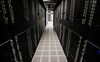 Servers and hard drives stand inside pod one of International Business Machines Corp.'s (IBM) Softlayer data center in Dallas.