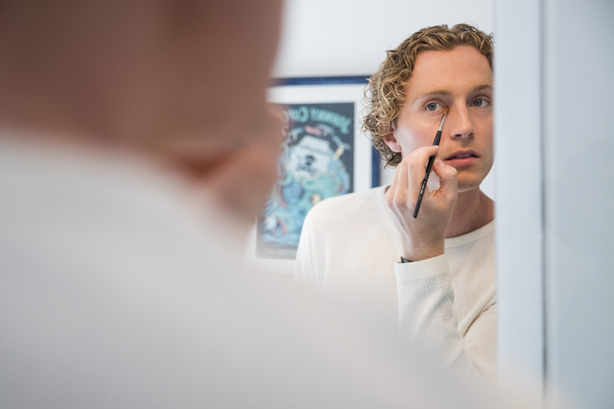 Axel Getz, 24, is part of a growing number of men interested in makeup. A recent poll showed about one third of men under 45 are willing to try cosmetics.
