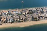 Residential villas on the waterside of the Palm Jumeirah in Dubai, United Arab Emirates.