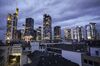 Skyscrapers including the Commerzbank AG headquarters, left, and twin tower headquarters of Deutsche Bank AG, right, stand illuminated at sunrise in the financial district of Frankfurt, Germany, on Monday, Oct. 21, 2019. U.K. Prime Minister Boris Johnson is making a fresh bid to deliver on his promise to take Britain out of the European Union on Oct. 31 amid mounting optimism that he now has the backing to get his deal through Parliament.
