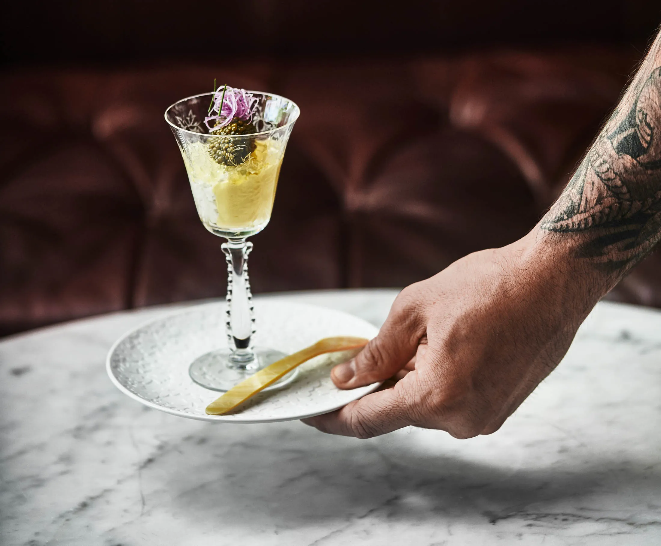 Caviar, served on egg custard at the Office, is a hallmark of the fine dining revival.