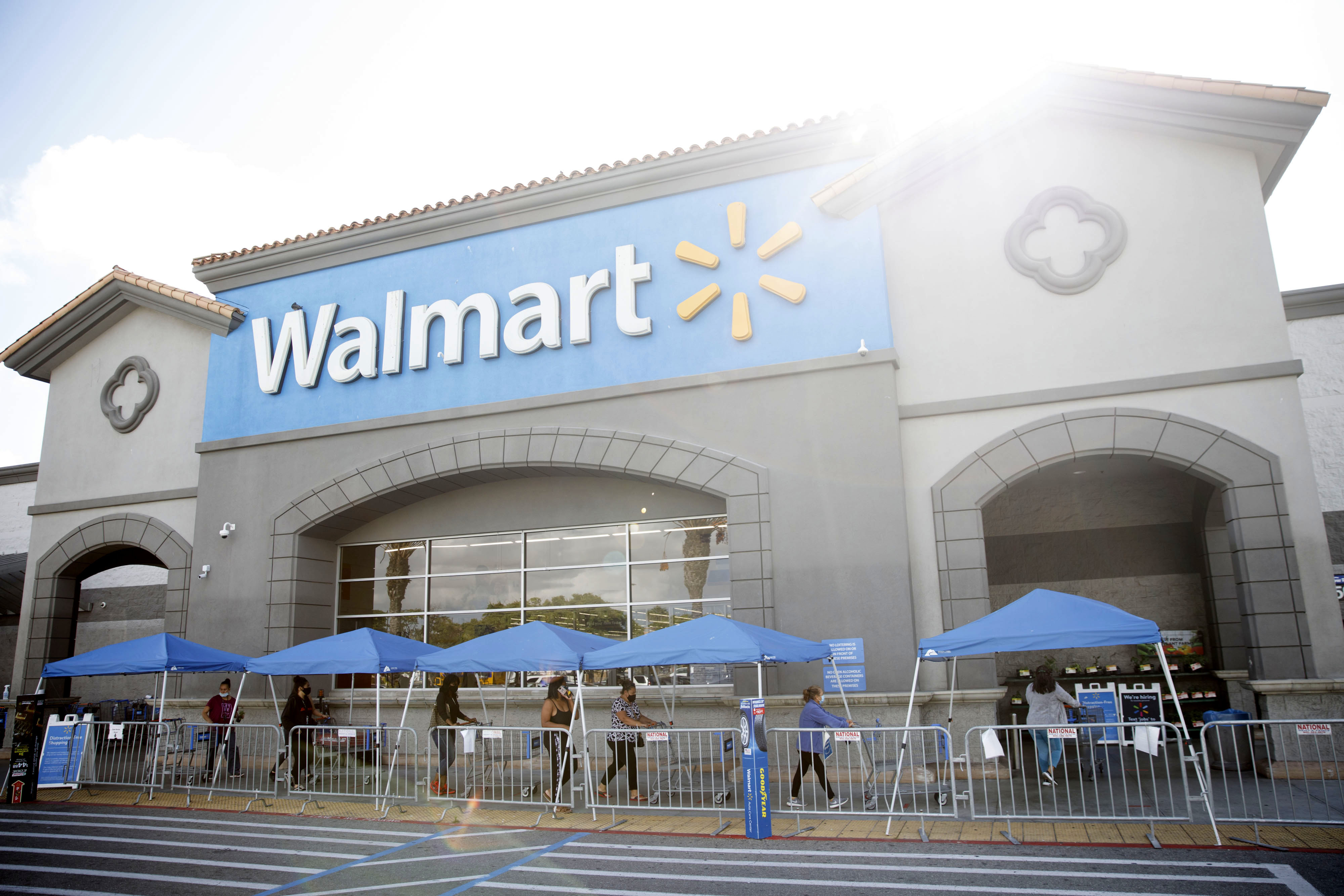 Shoppers enter a Walmart store in Torrance, California on May 19.