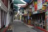 Stores and bars stand closed on Haji Lane during a partial lockdown imposed due to the coronavirus in Singapore on Tuesday, April 7, 2020. Singapore defended its decision not to close its schools earlier as the Southeast Asian country goes into a partial lockdown from today to stem the spread of the coronavirus.