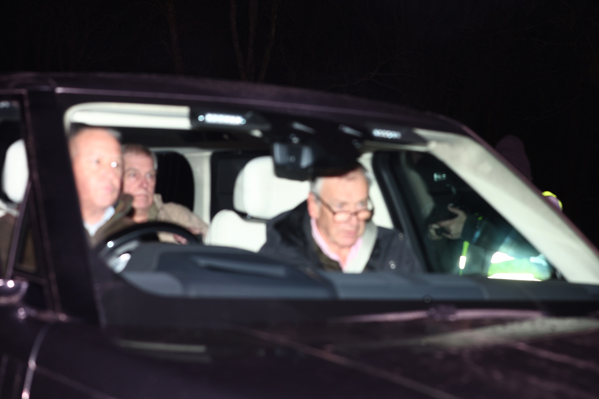 Andrew Mountbatten-Windsor, center, arrives at Sandringham after leaving police custody, on Feb. 19. Photographer: Peter Nicholls/Getty Images