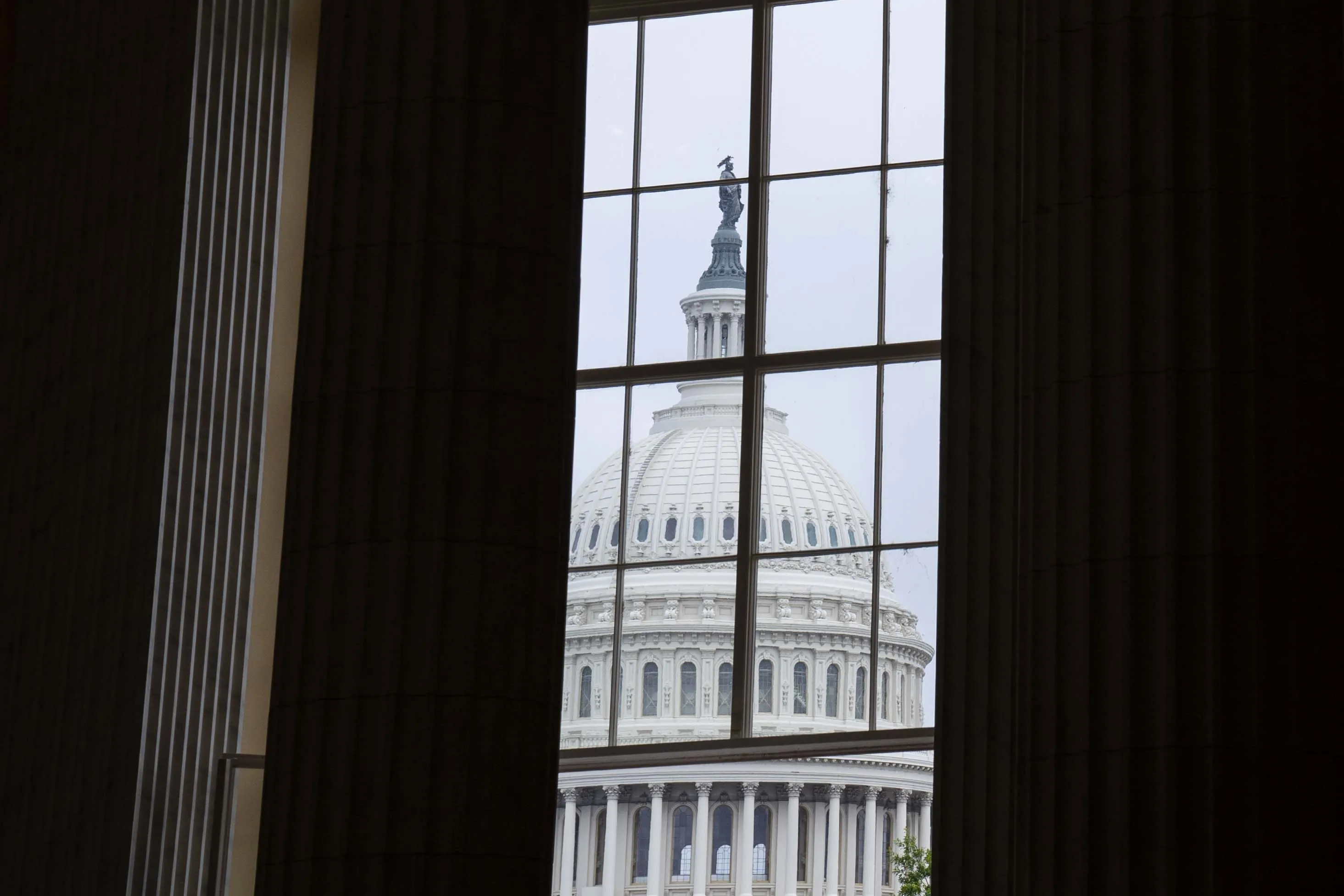 The US Capitol dome through a window in the Cannon House Office Building in Washington, DC, US, on Tuesday, May 30, 2023.&nbsp;