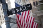 A Wall Street street sign