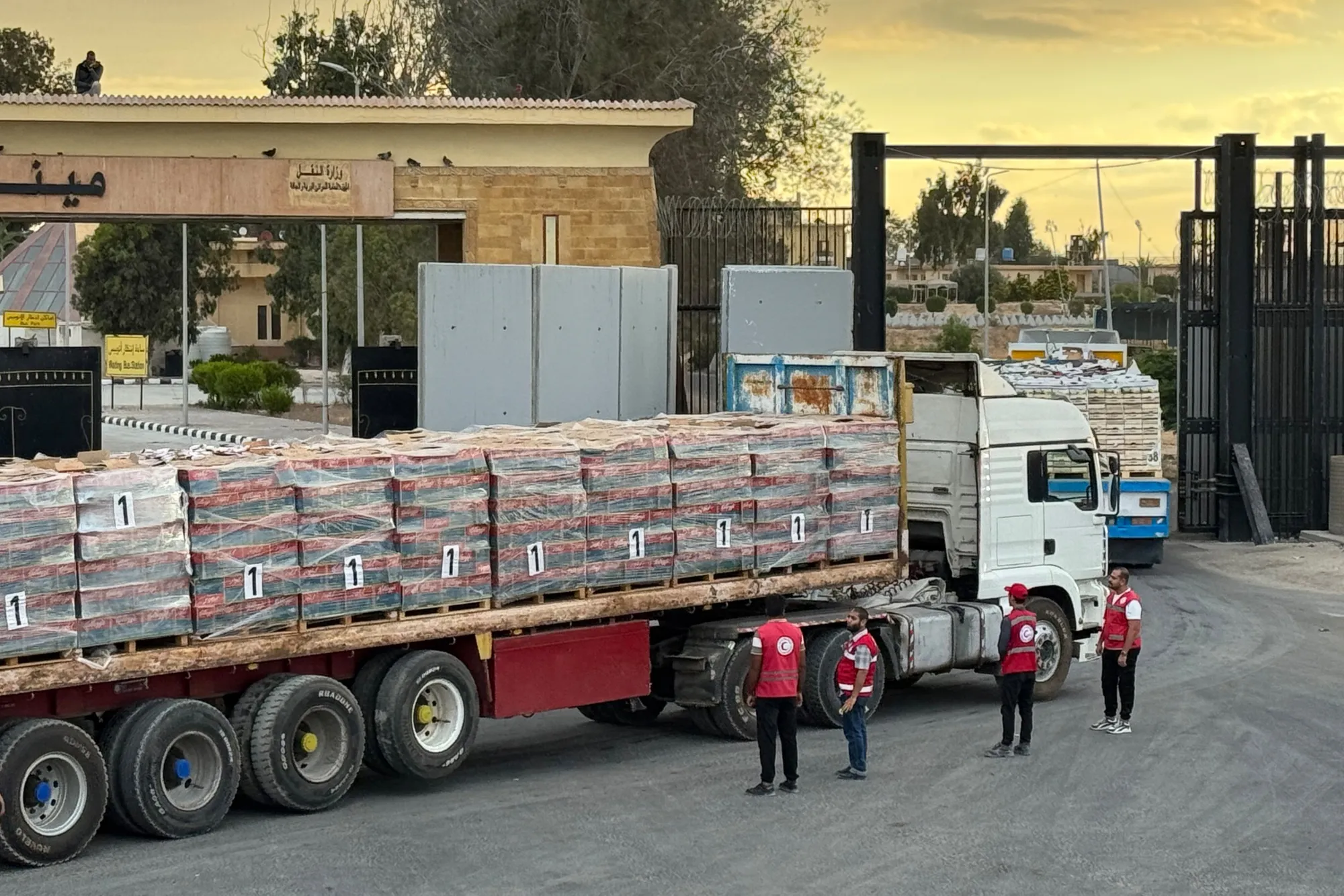 Trucks loaded with humanitarian aid on the Egyptian side of the Rafah crossing&nbsp;on Oct. 12.