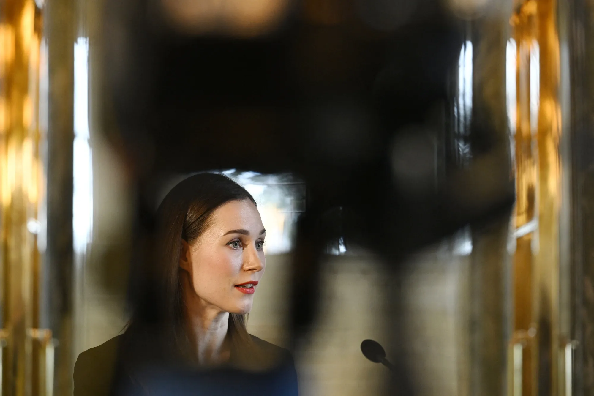 Sanna Marin speaks at Parliament in Helsinki on April 5.
