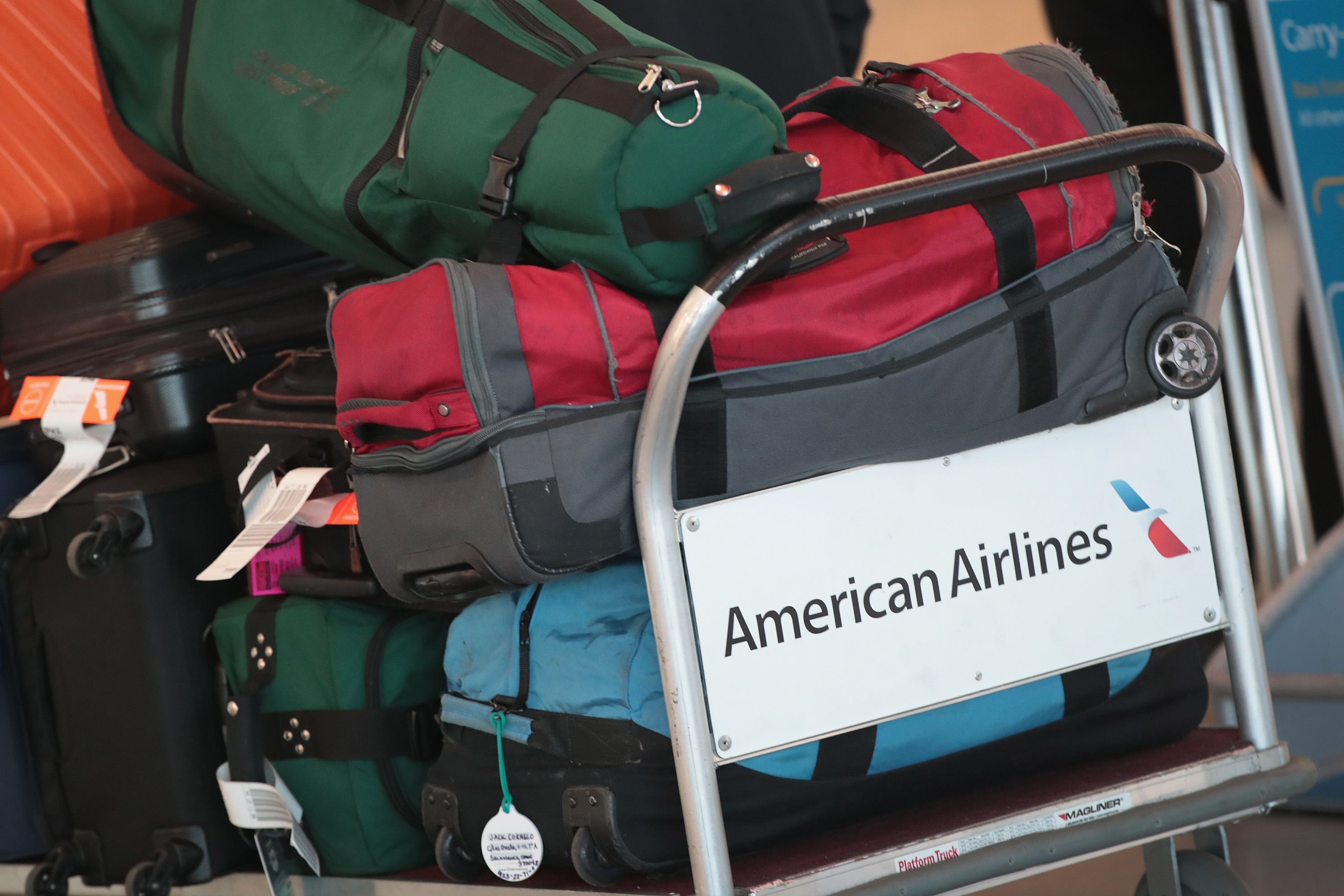 Luggage is prepared for an American Airlines flight at O'Hare International Airport in Chicago.