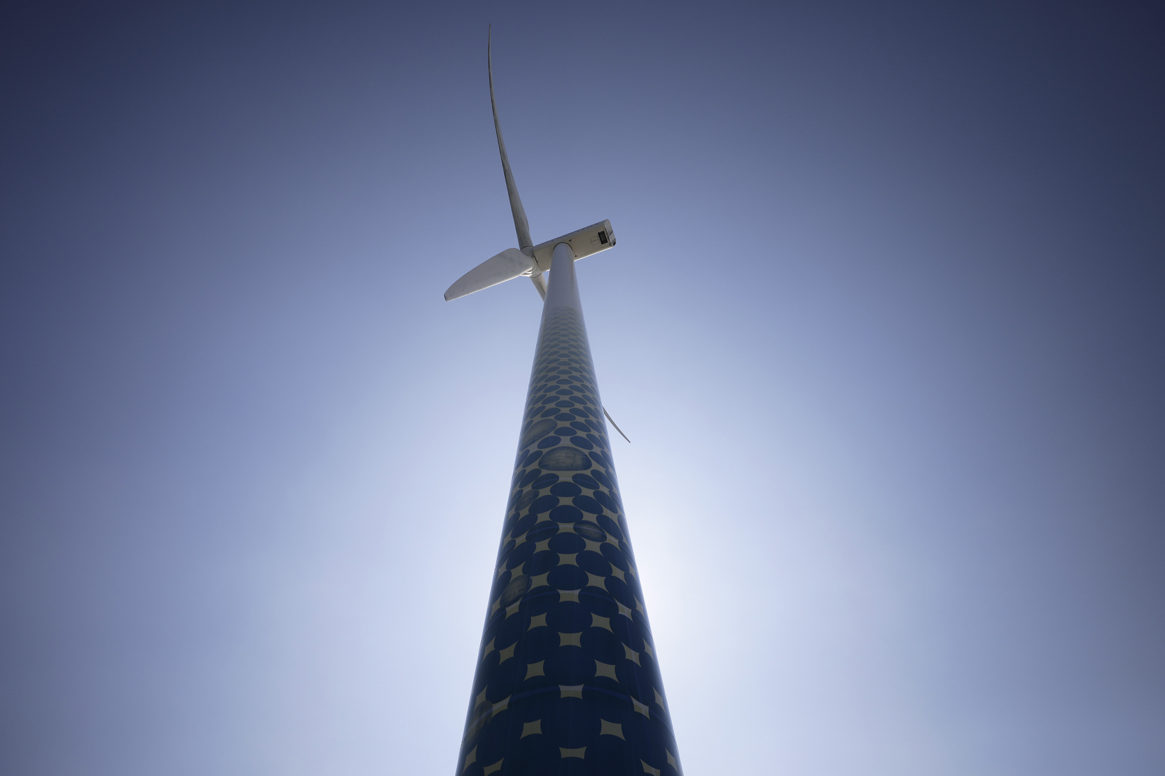 A wind turbine operates at a wind power plant during a demonstration of a hydrogen supply chain system in Yokohama, Japan.