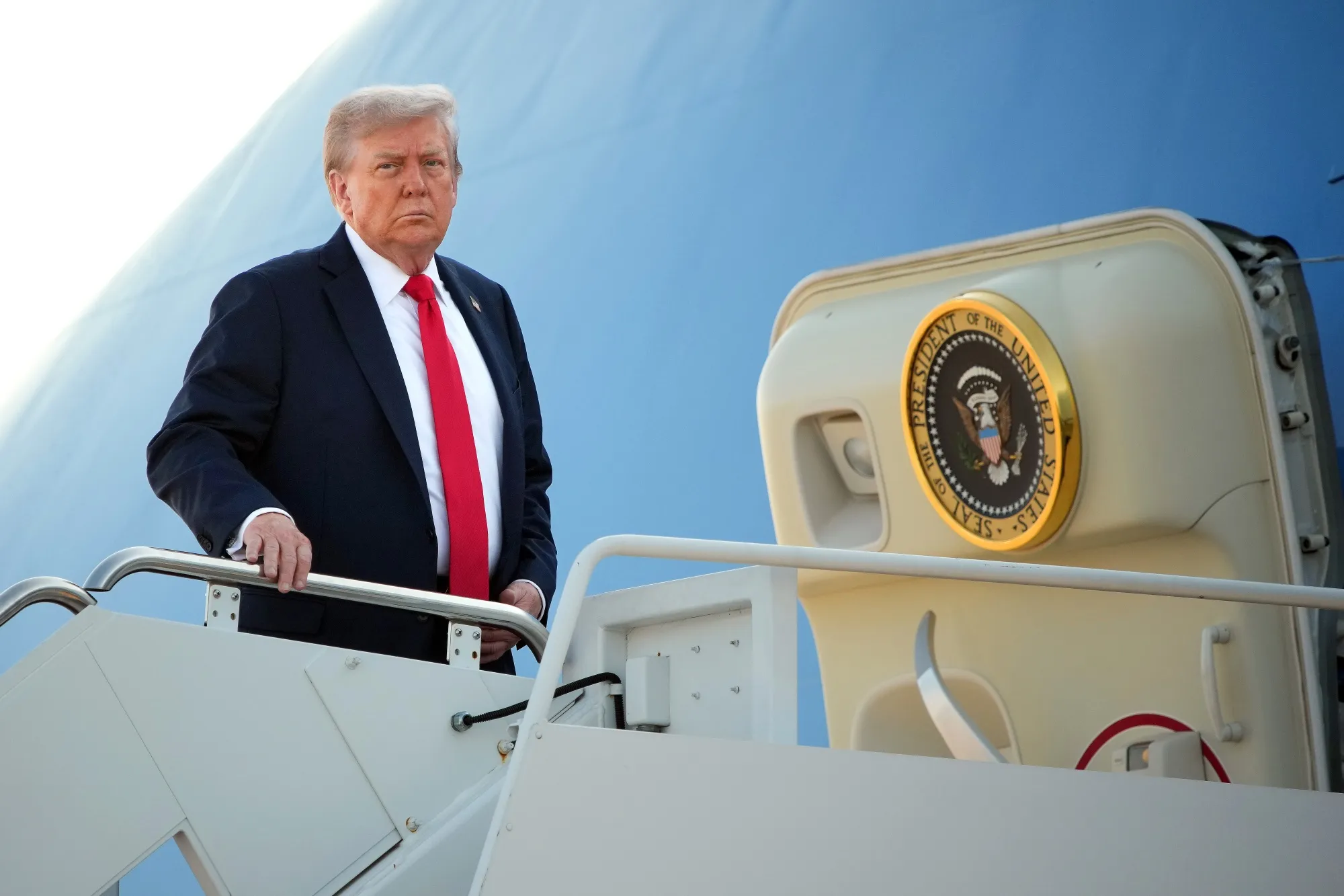 Donald Trump boards Air Force One on Aug. 15.