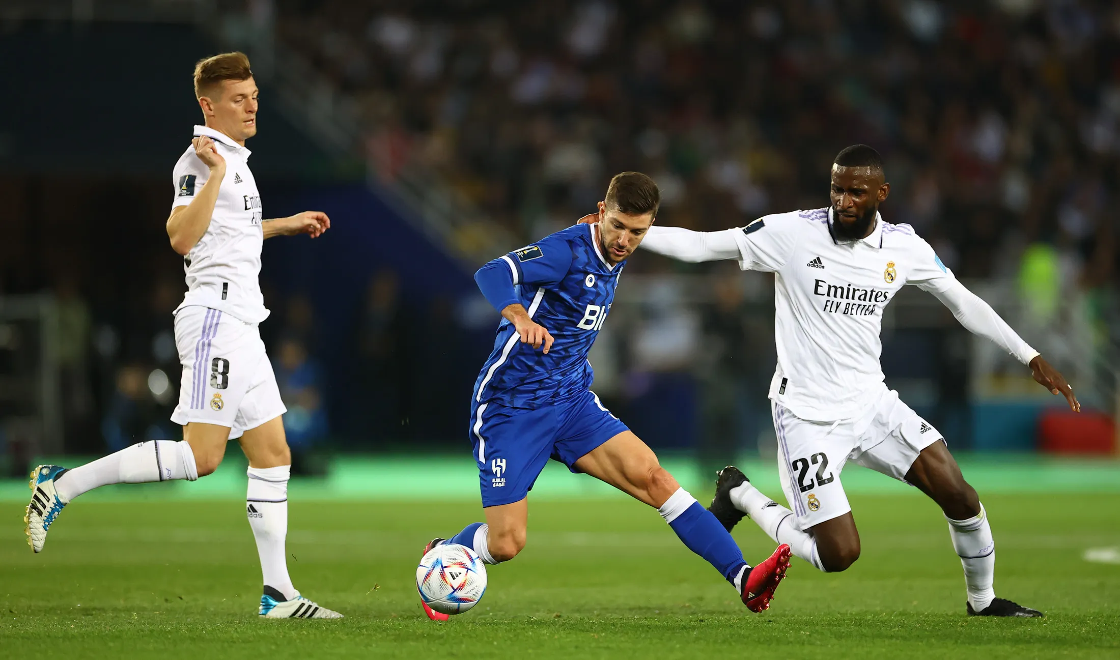 Luciano Vietto of Al Hihal is challenged by Antonio Rudiger of Real Madrid during the FIFA Club World Cup Morocco in 2023.