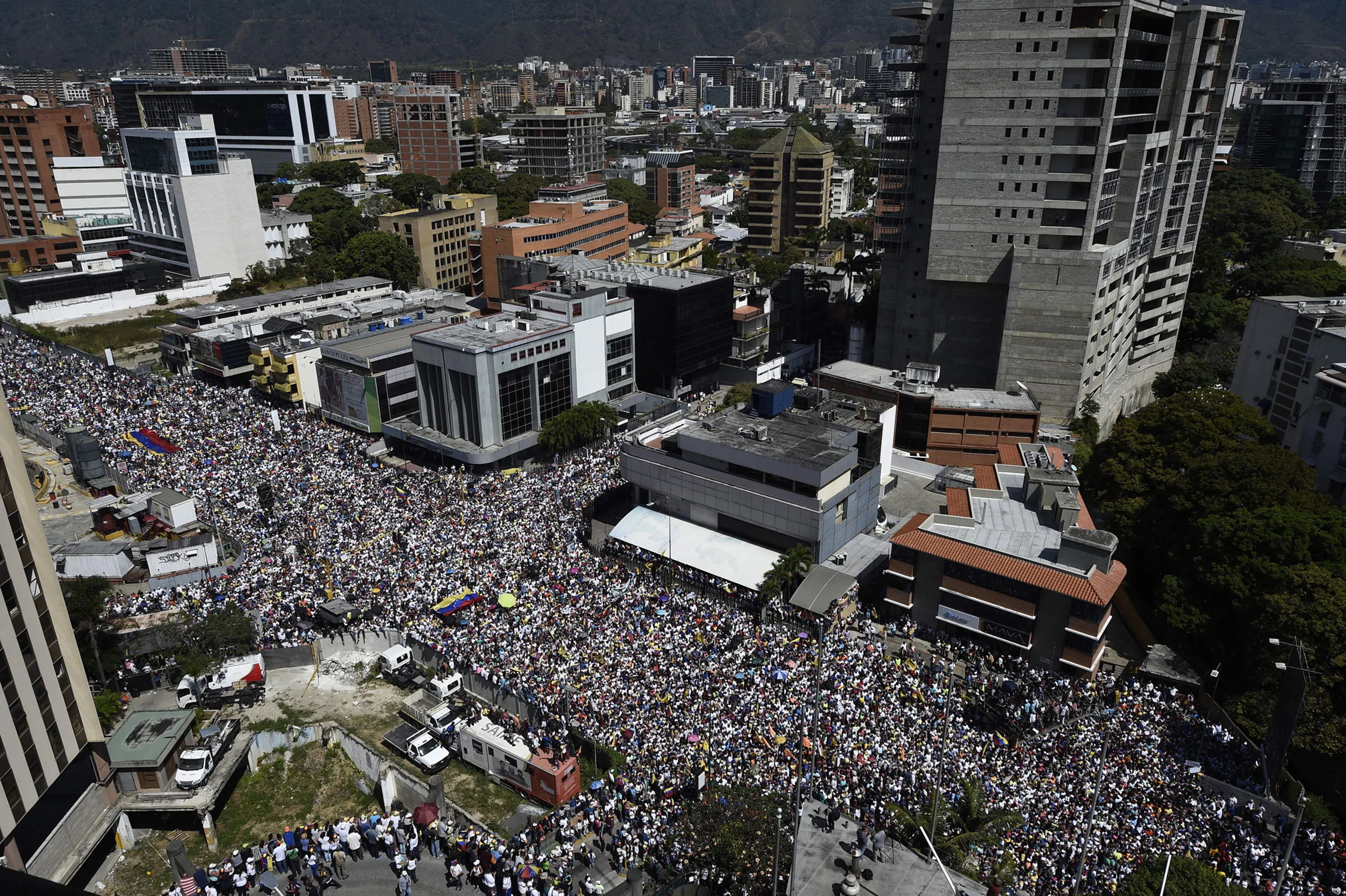 Opposition activists pour to the streets to back Venezuelan opposition leader Juan Guaido's calls for early elections, in Caracas on February 2, 2019. - Tens of thousands of protesters were set to pour onto the streets of Caracas to back self-proclaimed acting president Guaido's calls for early elections as international pressure increased on President Nicolas Maduro to step down. Major European countries have set a Sunday deadline for Maduro to call snap presidential elections. (Photo by Federico PARRA / AFP) (Photo credit should read FEDERICO PARRA/AFP/Getty Images)