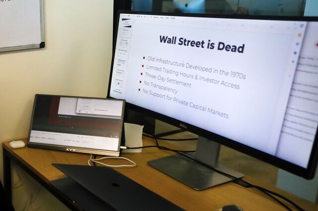 A computer screen showing a presentation titled "Wall Street Is Dead."