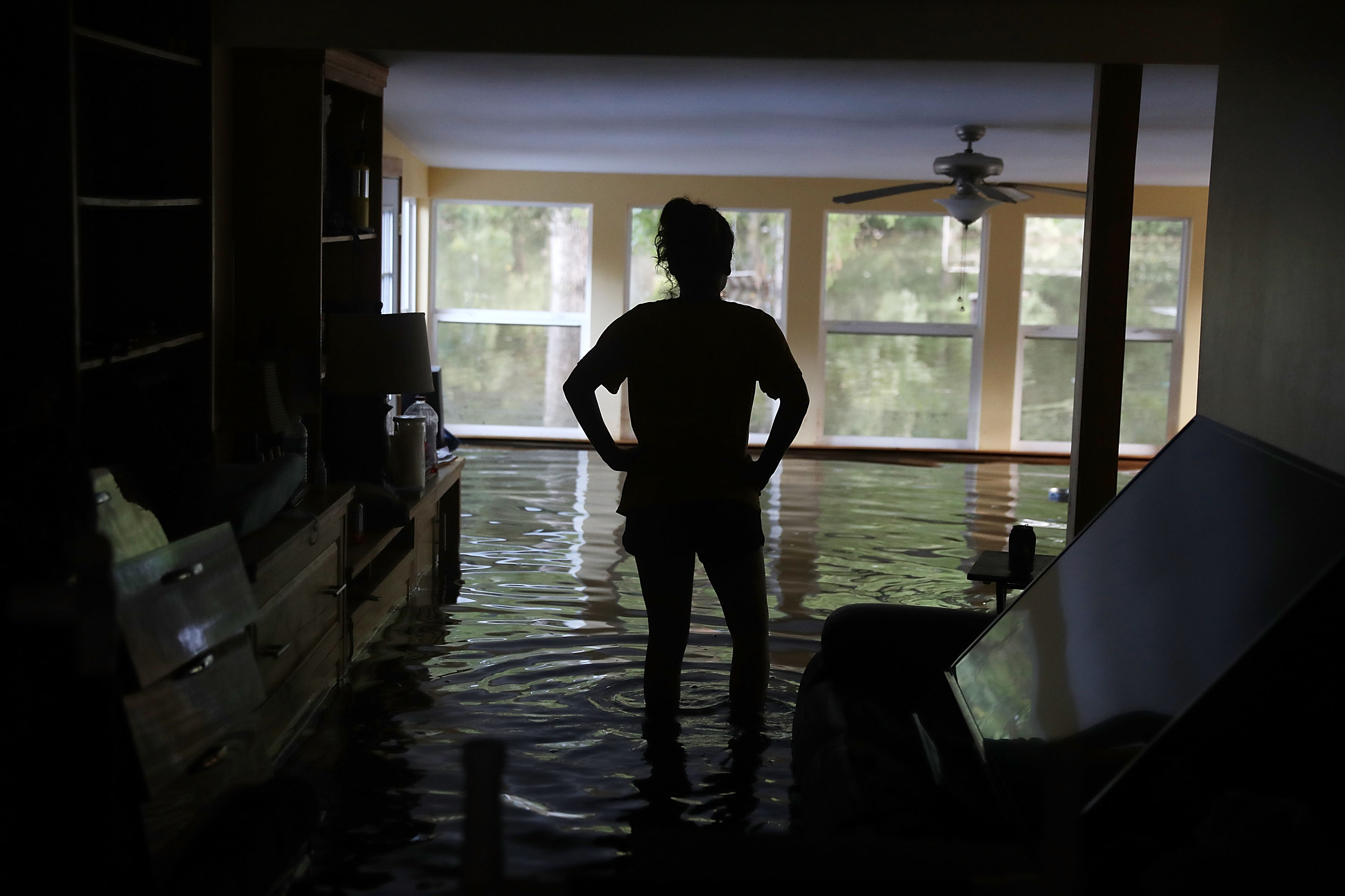 A homeowner surveys flood damage&nbsp;in Sorrento, La.
