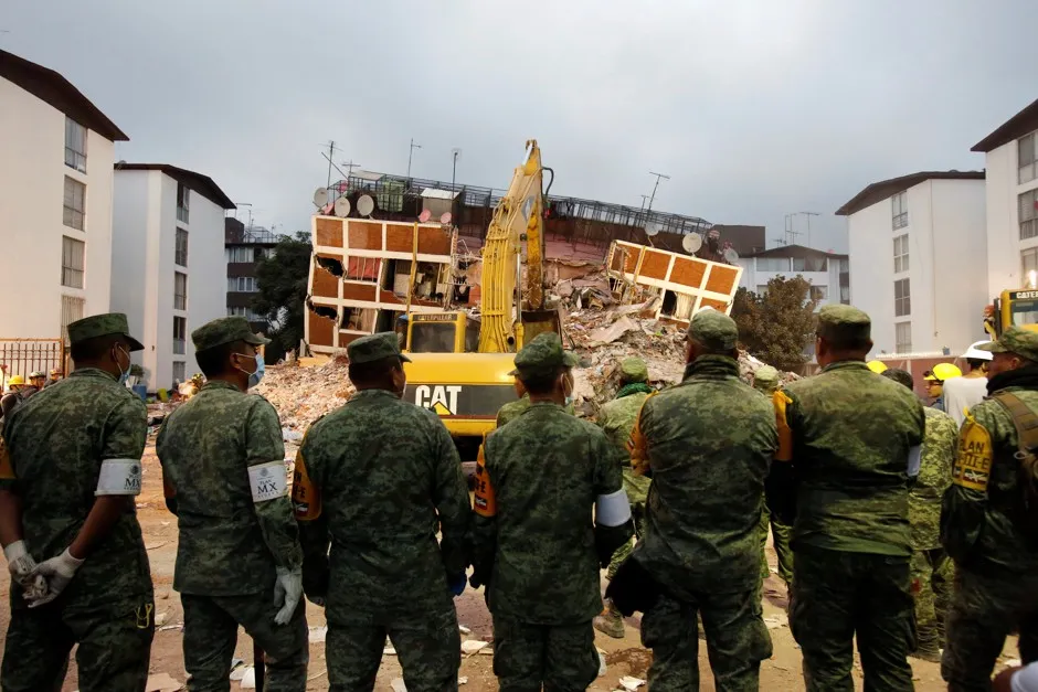 Soldiers outside a collapsed building in Mexico City on September 20, 2017.