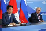 Shinzo Abe and Vladimir Putin.