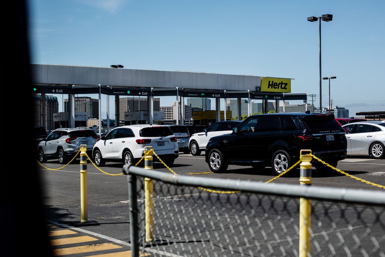 Hertz Says Travel Demand Returning After 33 Revenue Decline Bloomberg