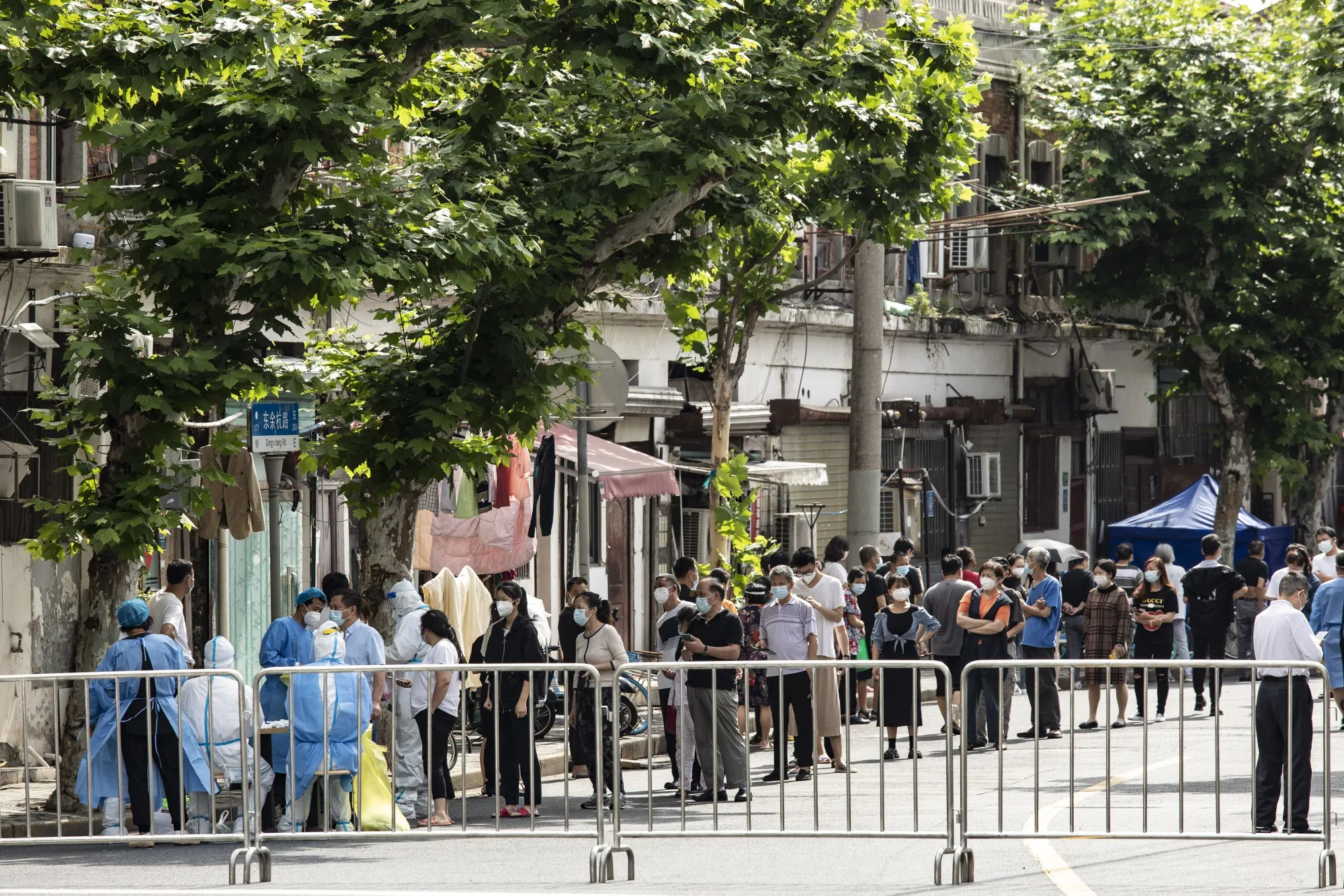 Residents queue for a Covid-19 test in Shanghai&nbsp;on Saturday, June 11, 2022.&nbsp;