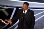 Will Smith accepts the Actor in a Leading Role award for ‘King Richard’ on March 27.