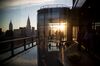 Guests attend a pool party in the penthouse apartment at 50 United Nations Plaza in New York, U.S., on Tuesday, June 07, 2016.
