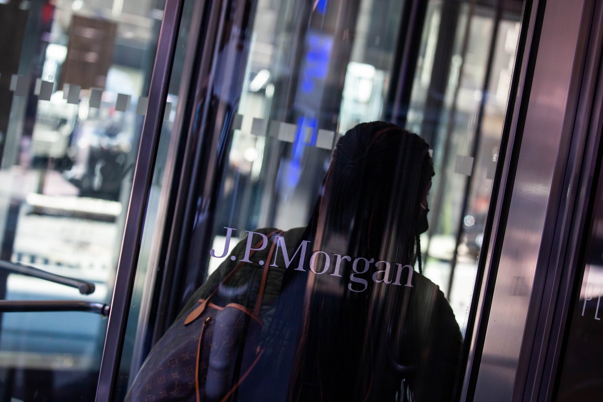 A man enters JPMorgan Chase & Co.'s headquarters in New York on 21 September. 
