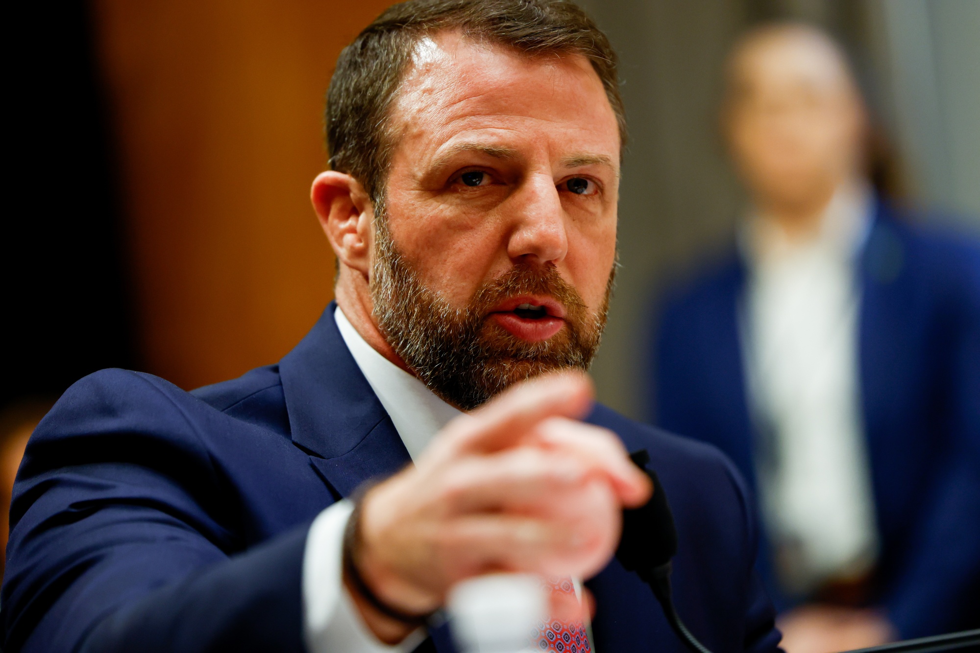 Senator Markwayne Mullin, a Republican from Oklahoma and secretary of Homeland Security nominee for US President Donald Trump, speaks during a Senate Homeland Security and Governmental Affairs Committee confirmation hearing in Washington, DC, US, on Wednesday, March 18, 2026. President Donald Trump's nominee to lead the Department of Homeland Security will face pointed questions from senators about his limited management and homeland security experience. Photographer: Kent Nishimura/Bloomberg