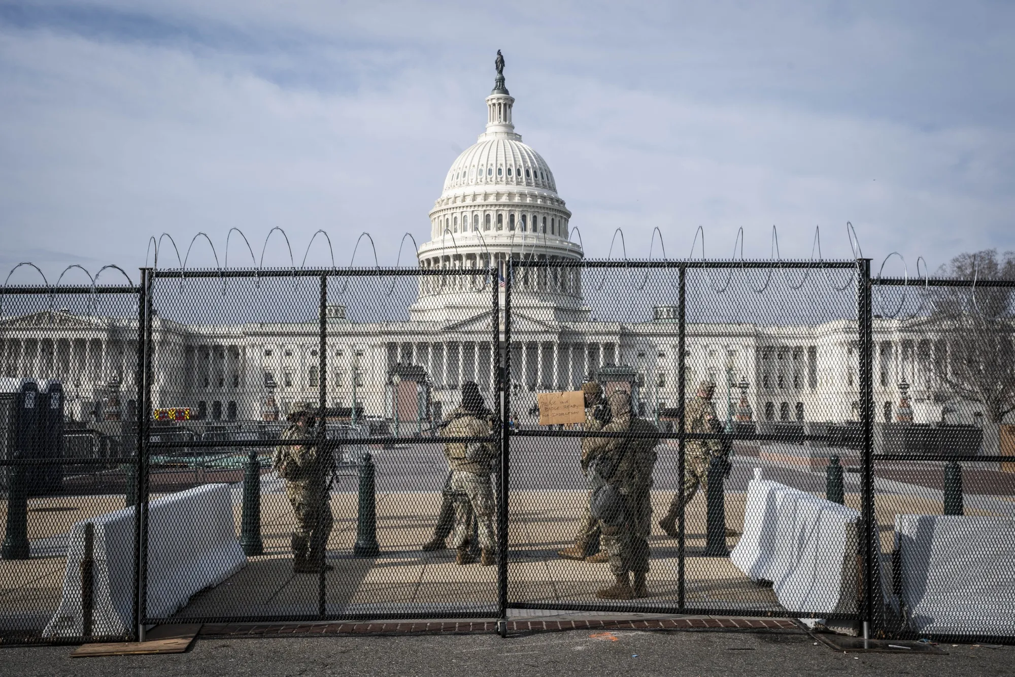 Members of the National Guard stand around the perimeter of the U.S. Capitol in Washington, D.C., on&nbsp;Jan. 15.&nbsp;
