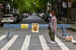 A barricaded street in the Chelsea neighborhood of Manhattan during the early phase of the coronavirus pandemic in May 2020. One year later, the long-term fate of Covid-era traffic restrictions is uncertain in many U.S. cities. 