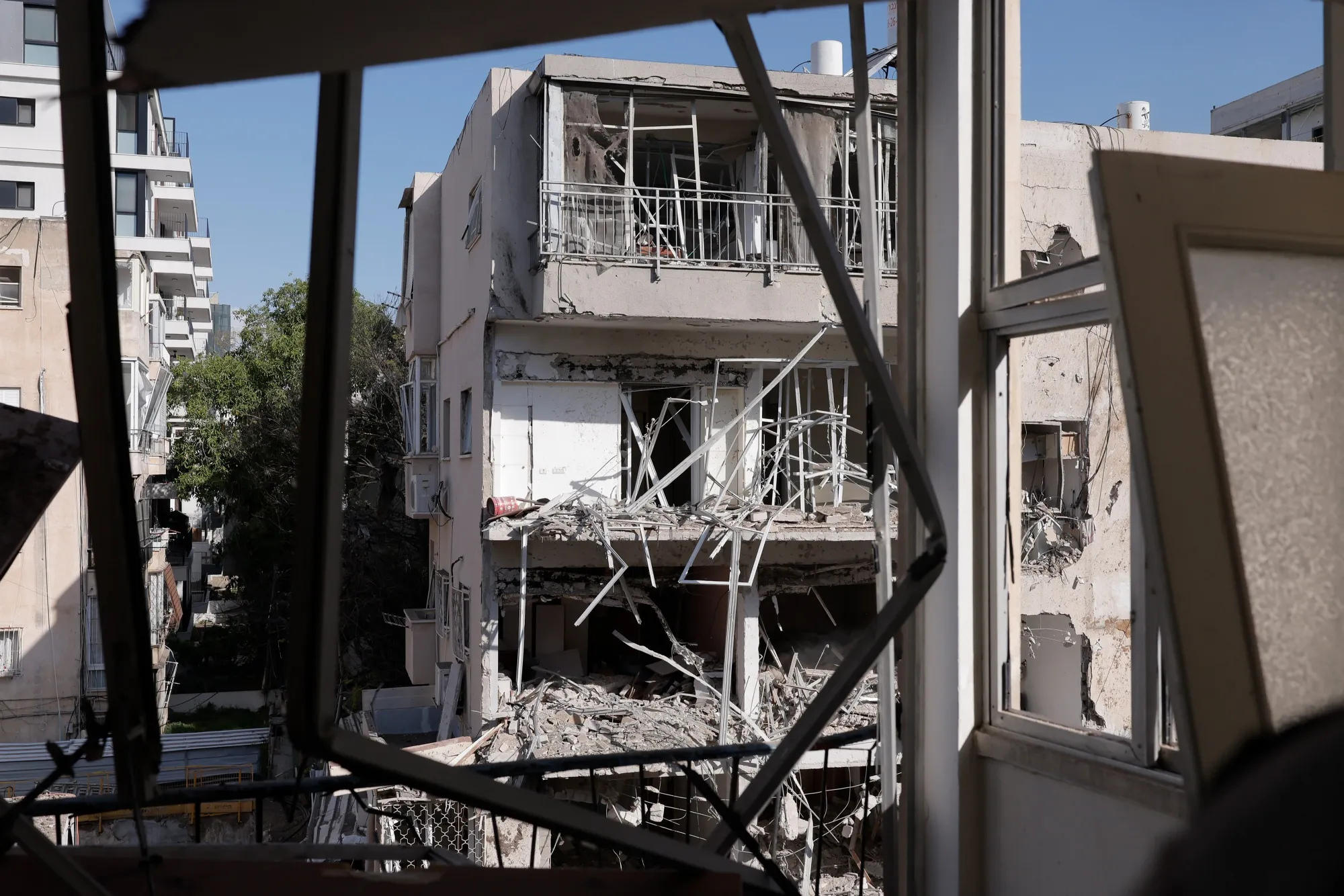Blast damage to an apartment block following an overnight missile attack by Iran in Tel Aviv, on March 24.