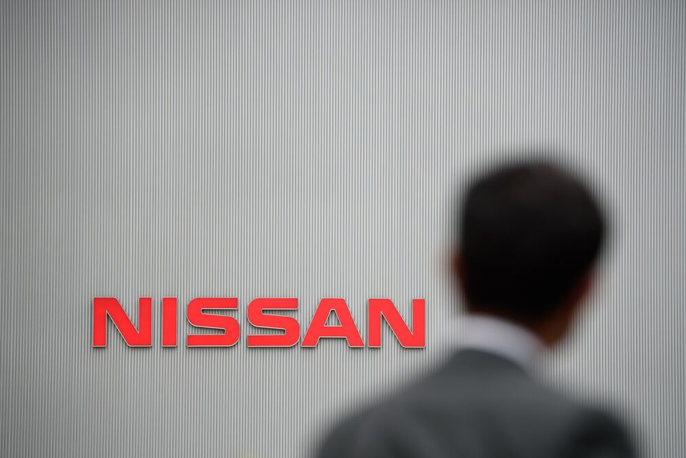 A company logo stands on the exterior of the Nissan Motor Co. headquarters in Yokohama, Japan.