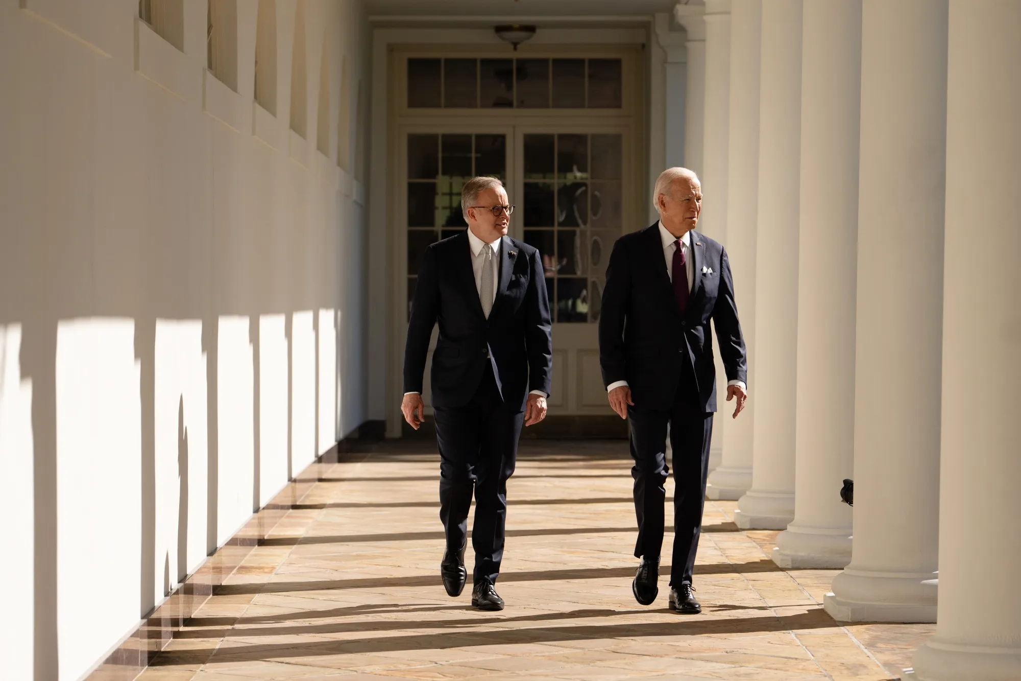 President Joe Biden, right, and Prime Minister Anthony Albanese&nbsp;walk through the Colonnade of the White House during a state visit in Washington, DC,&nbsp;on&nbsp;Oct. 25.