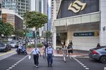 Pedestrians in the central business district in Singapore, on Monday, Sept. 6, 2021. 
