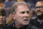 Phoenix Suns owner Robert Sarver watches the team play against the Memphis Grizzlies during the second half of an NBA basketball game in Phoenix, Dec. 11, 2019. The NBA has suspended Phoenix Suns and Phoenix Mercury owner Robert Sarver for one year, plus fined him $10 million, after an investigation found that he had engaged in what the league called “workplace misconduct and organizational deficiencies.&quot; The findings of the league's report, published Tuesday, Sept. 13, 2022, came nearly a year after the NBA asked a law firm to investigate allegations that Sarver had a history of racist, misogynistic and hostile incidents over his nearly two-decade tenure overseeing the franchise. (AP Photo/Ross D. Franklin, File)