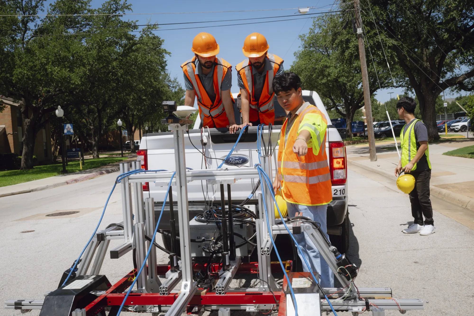 Researchers from the University of Texas at Arlington are putting together a mobile-scanning machine for bridge inspection, as extreme heat puts a strain on transportation infrastructure.