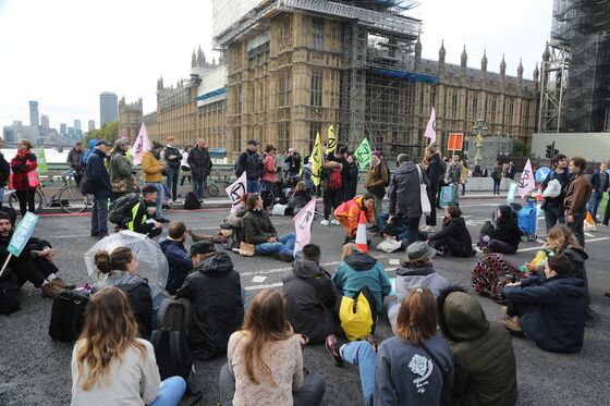 Climate Protesters Paralyze Central London as Arrests Mount