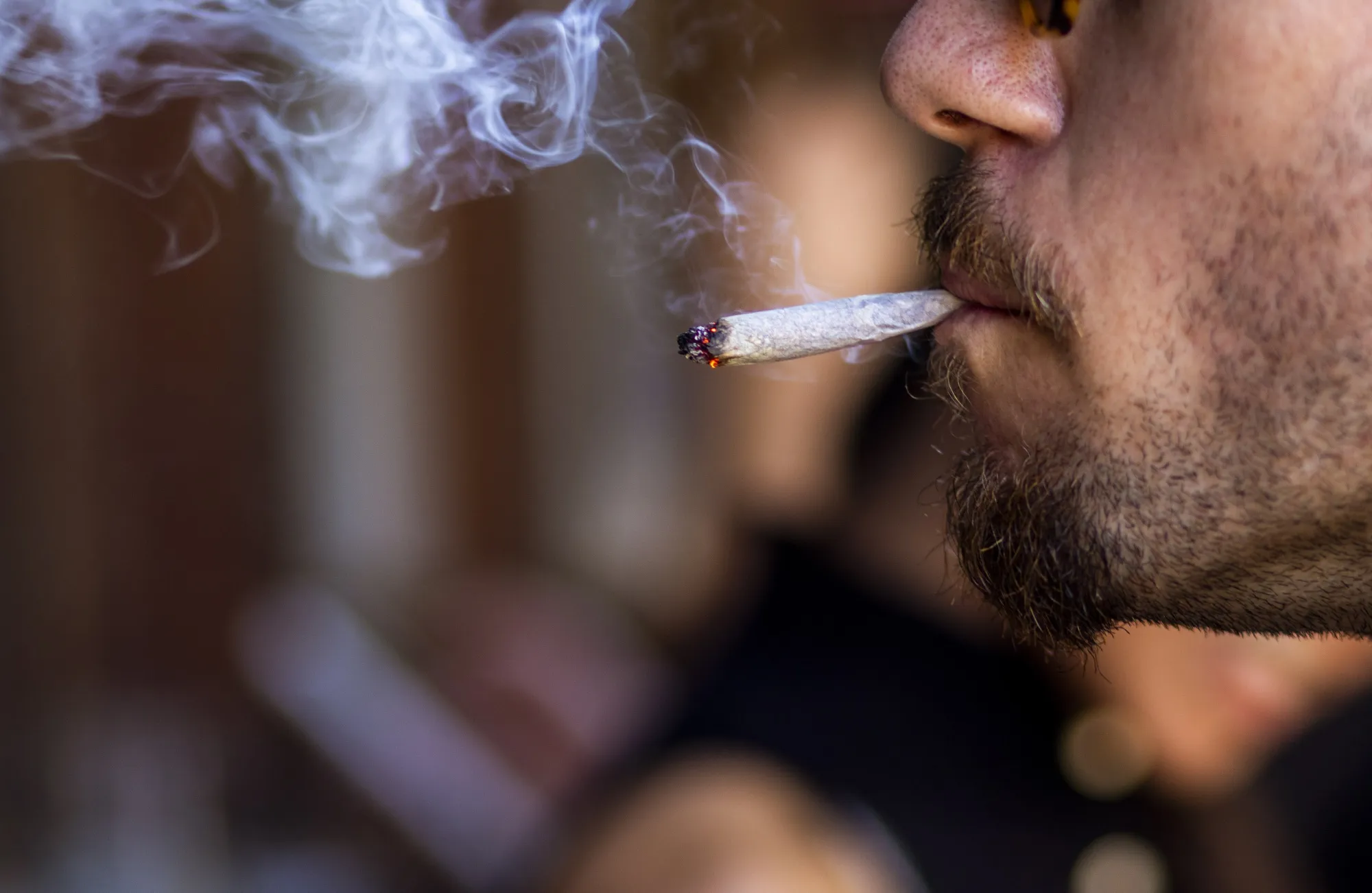 A man smokes marijuana&nbsp;in West Hollywood, California.