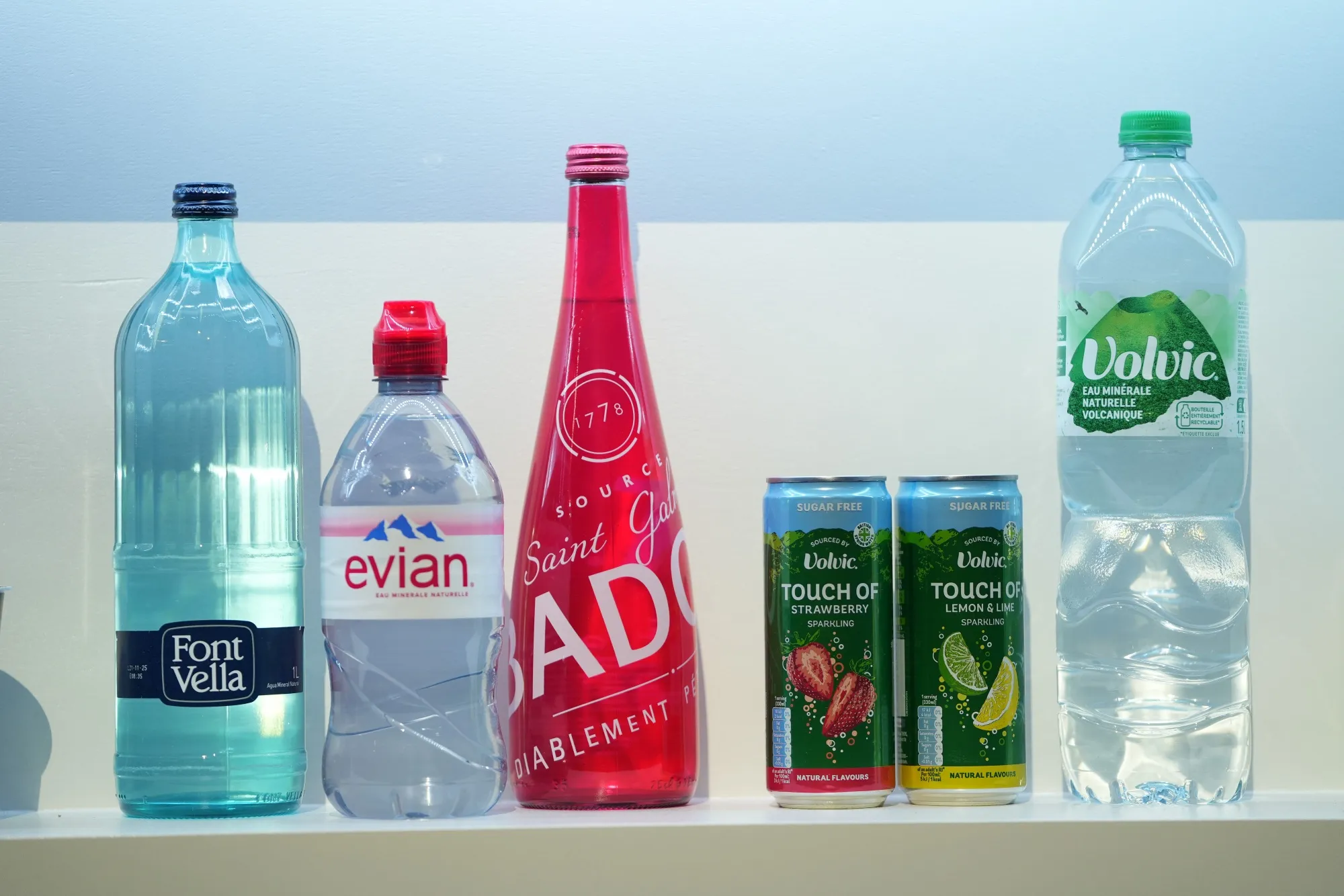 Water bottles and flavored beverages, including Evian, Volvic and Font Vella.