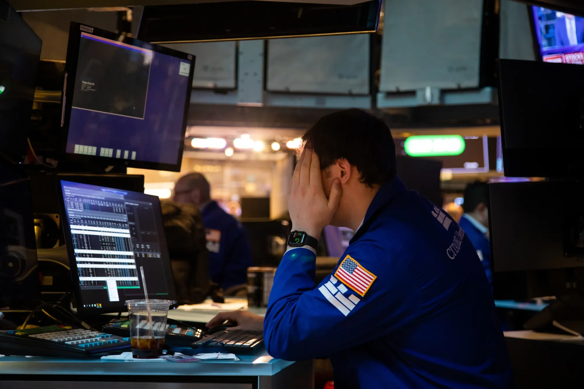 A trader works on the floor of the New York Stock Exchange.