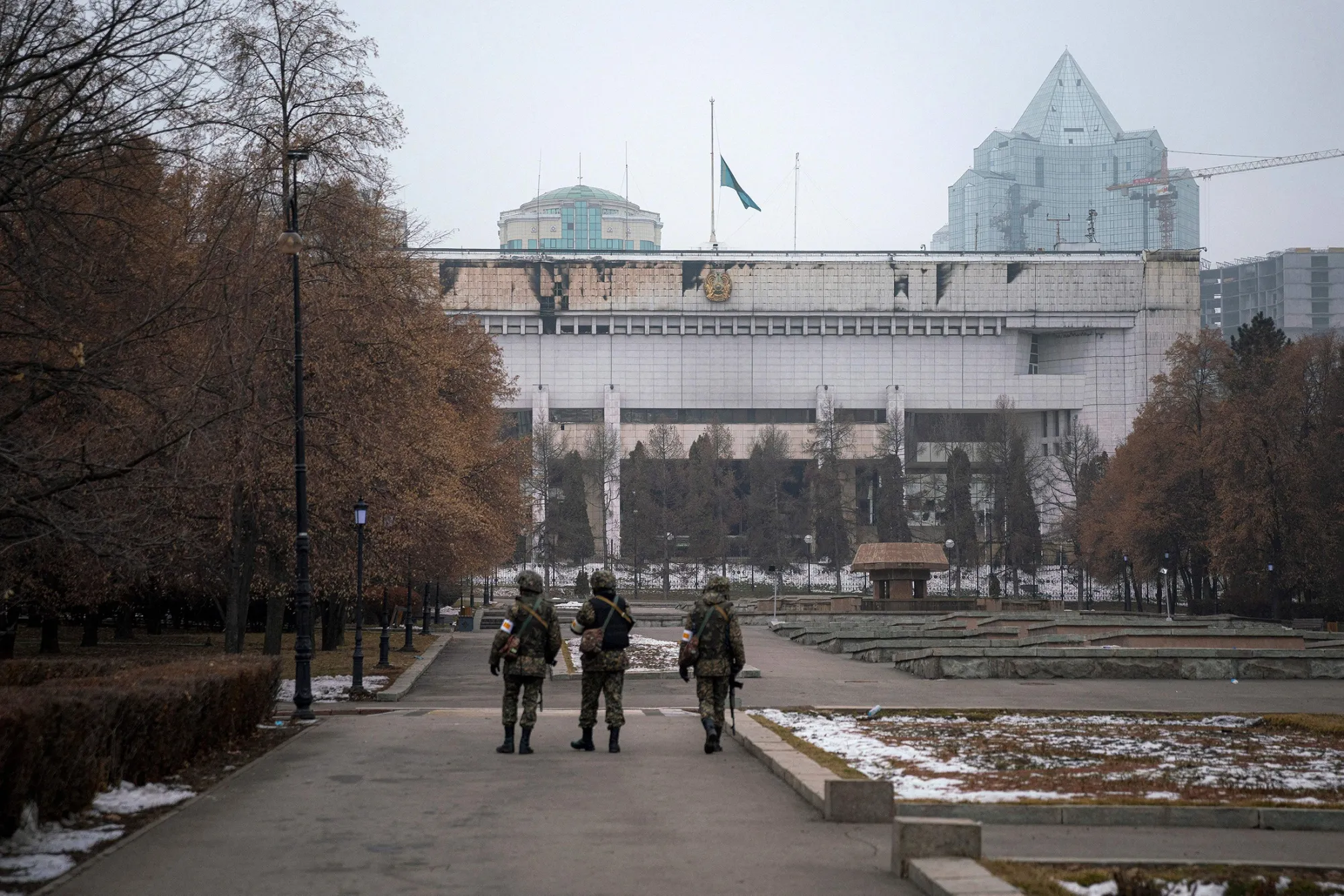 Kazakh soldiers patrol near an administrative building in central Almaty on Jan. 10.