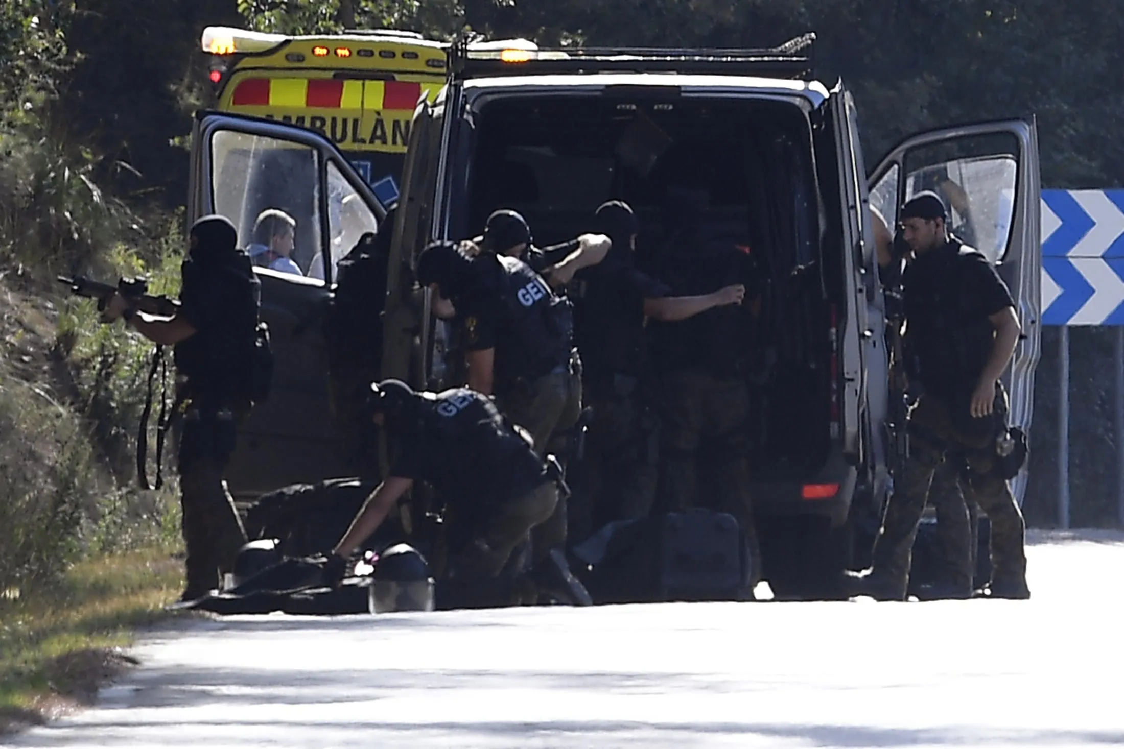 Explosive specialists at the site where Moroccan suspect Younes Abouyaaqoub was shot on Aug. 21, near Sant Sadurni d'Anoia, south of Barcelona.
