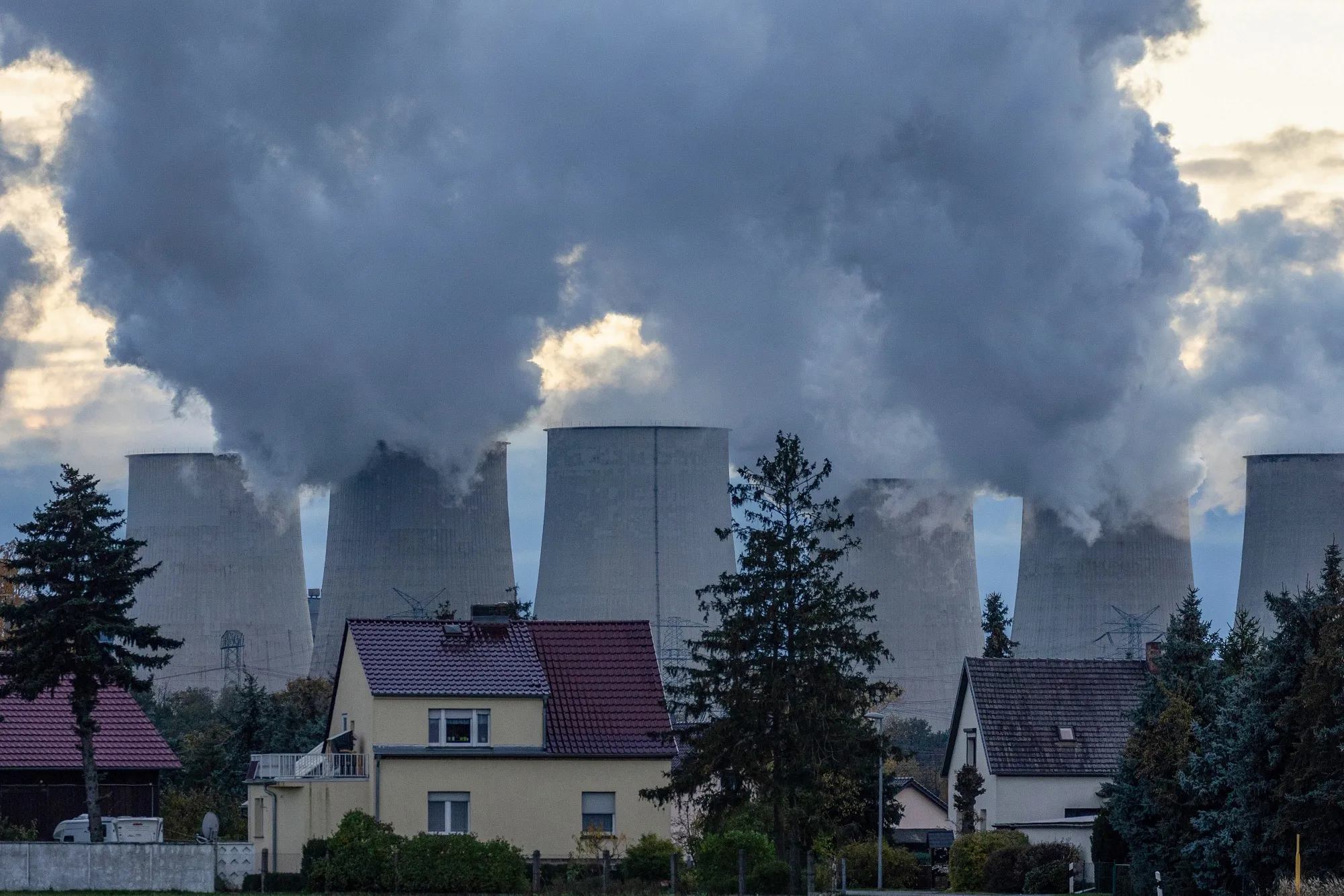 Residential houses near a&nbsp;lignite coal-fired power plant, in Jaenschwalde, Germany in 2023.