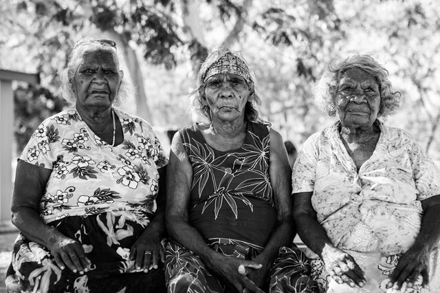 Dreamtime artists Peggy Patrick (center) with sisters Phyllis and Nora Thomas, nieces of Rover Thomas, one of the first internationally recognized Aboriginal painters.