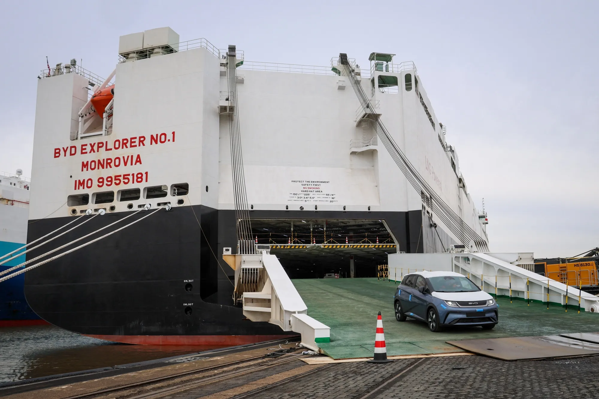 Electric vehicles of Chinese car manufacturer BYD leave the car carrier ship BYD Explorer No. 1 which is moored at the automotive terminal of operator BLG at the port of Bremerhaven, Germany, on Feb. 26, 2024.&nbsp;