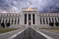 A gray sky hangs over the Federal Reserve building in Washin